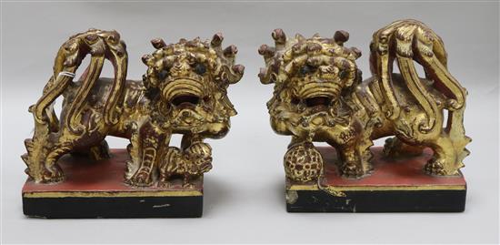 Two Chinese lion-dogs on plinths height 15.5cm